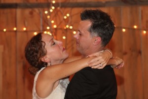 Nicky & Daniel dancing in the Handsome Red Barn at West Hill House B&B