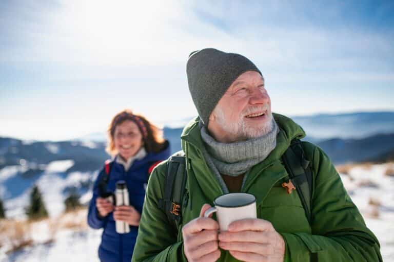 Welcome 30 An older couple out snowshoeing in Vermont's the mad river valley
