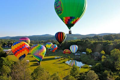 Hot Air Balloons over Vermont Hills.