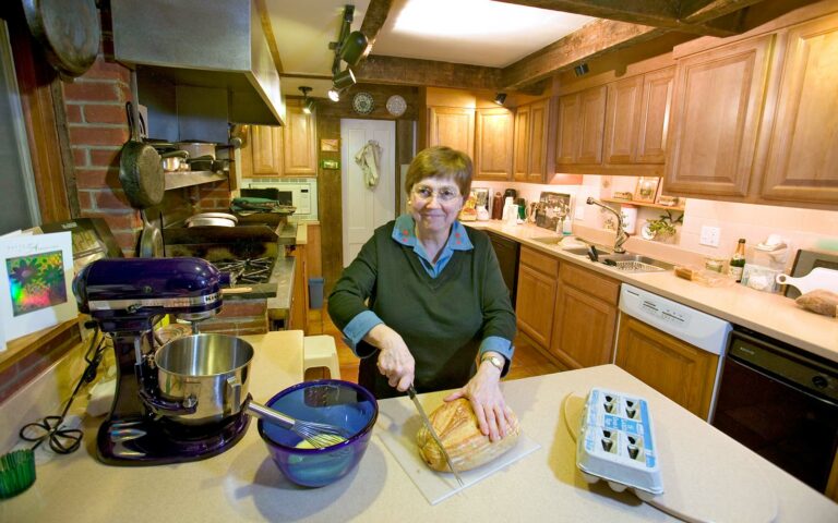 Susan preparing food at West Hill House B&B