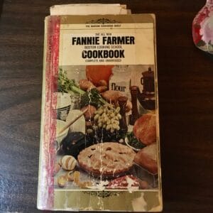 A picture of the cover of the Fannie Farmer cookbook.