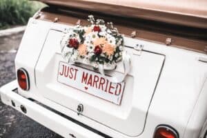 decoration on the wedding car as a couple is off to have their Vermont Honeymoon